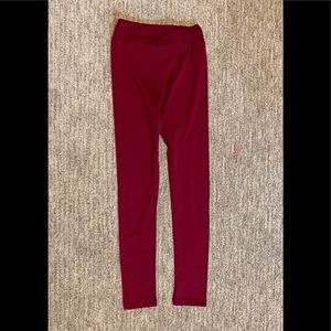 Girl’s dark purple LuLaRoe leggings